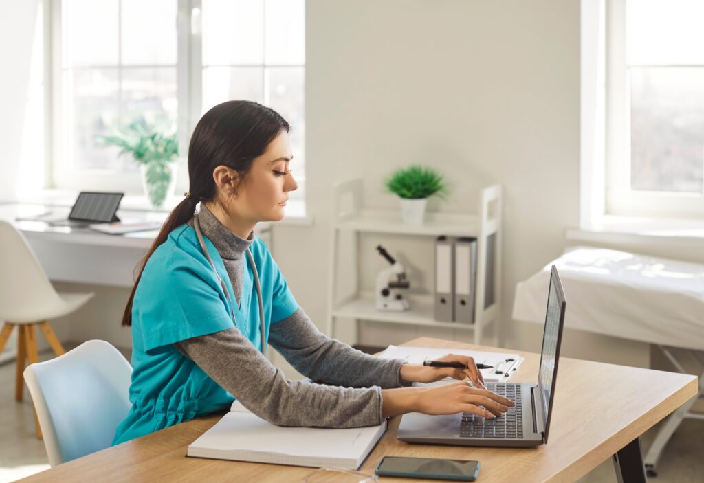 Nurse working at a computer